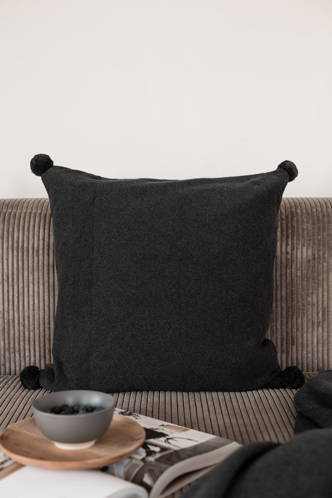 Grey pom pom cushion hot sale